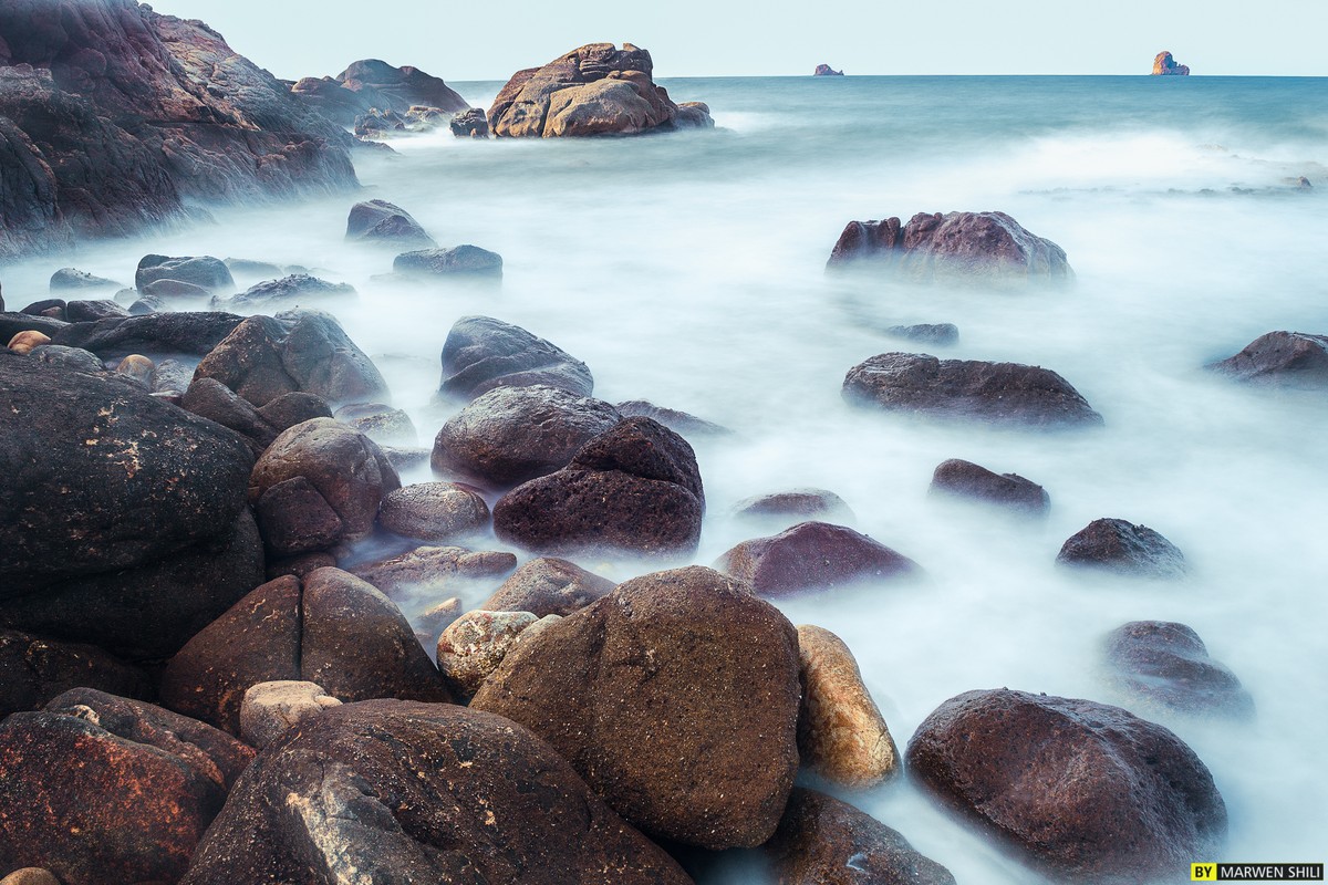 stock-photo-rocks-water-121394069