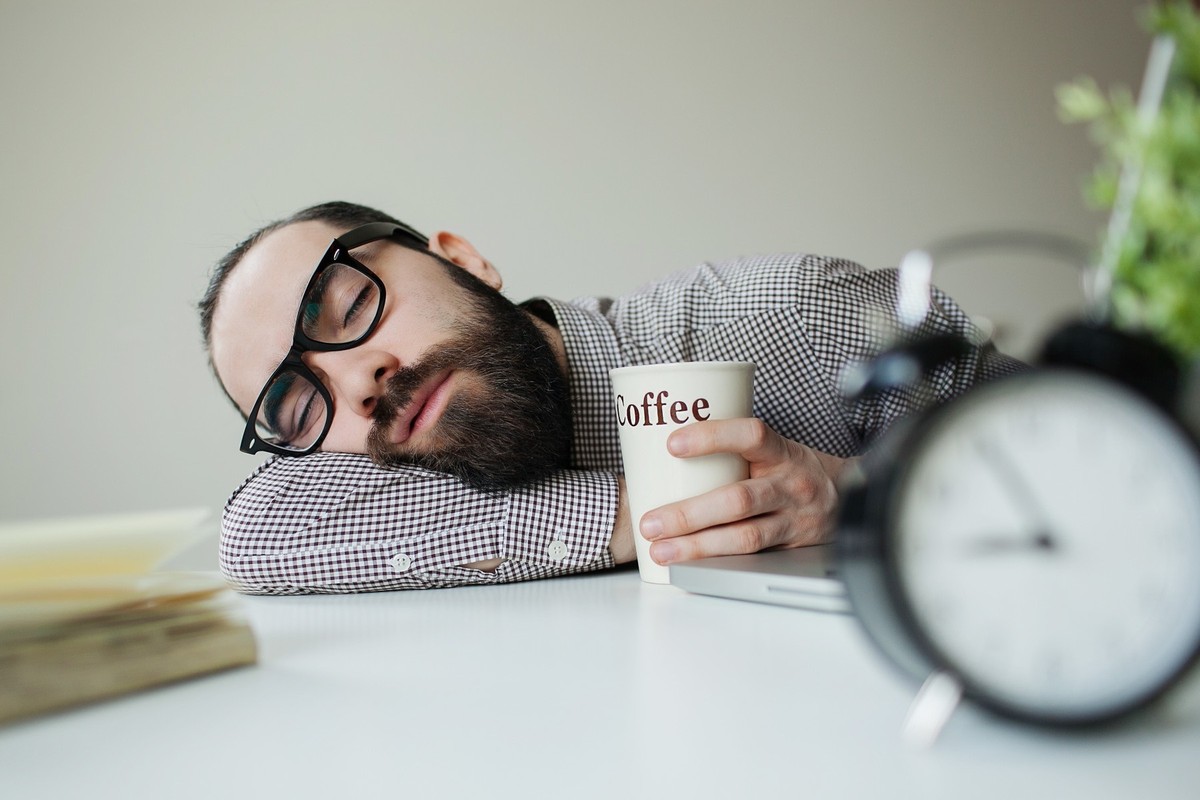Sleeping-man-with-coffee-cup-very-funny